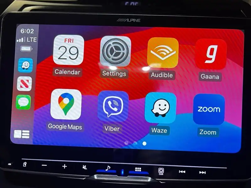 Apple CarPlay running on an Alpine touchscreen in a Toyota Camry